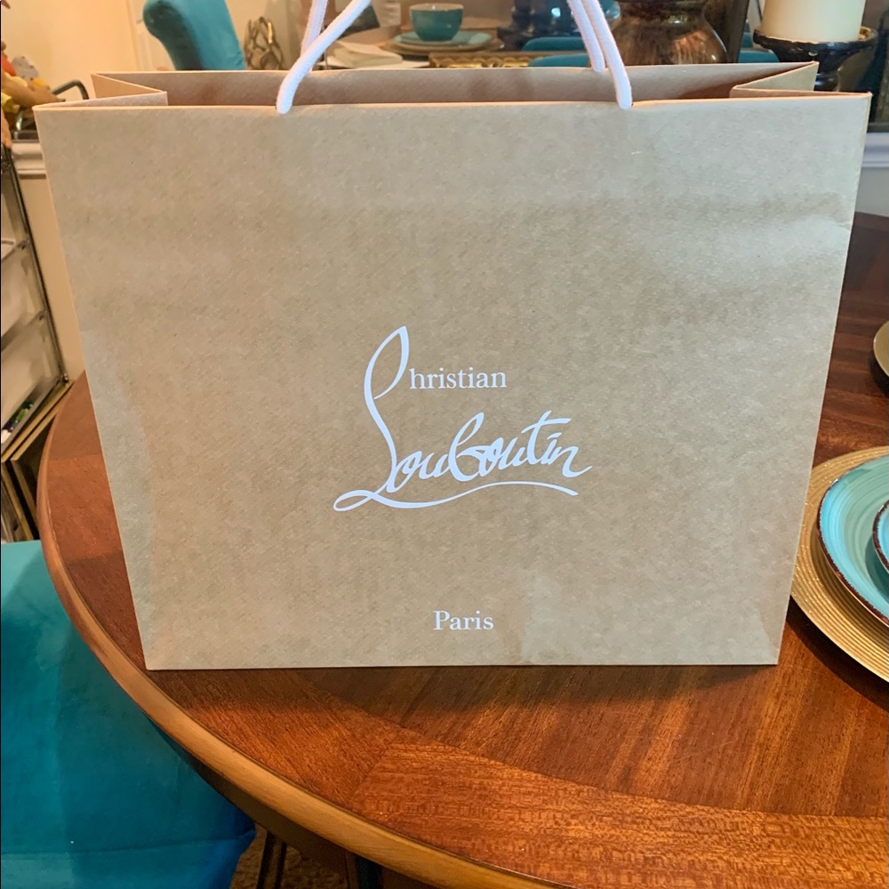 Christian Louboutin brown paper shopping bag